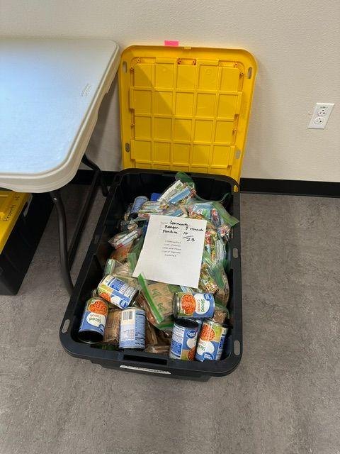 A bin of packed food ready for Leander ISD families